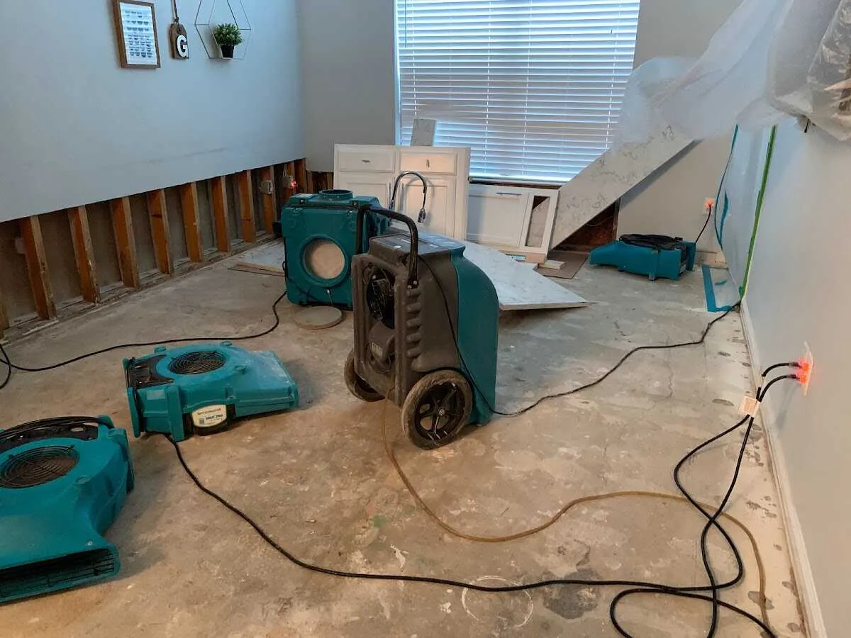 Dehumidifier in flood-cut room for Water Damage Restoration in Galliano