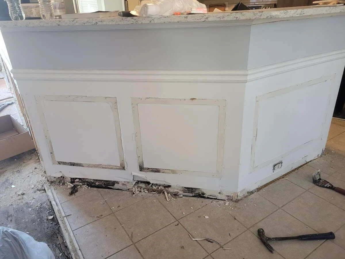 Water damage and mold on kitchen during Storm Damage Restoration in Galliano